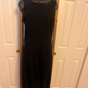 Ann Taylor Dress Size 6 with long back zipper. Moderately worn. Very Classy!
